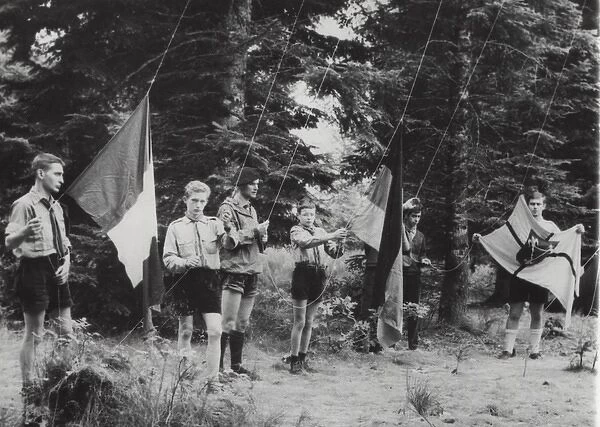 French boy scouts at camp with flags