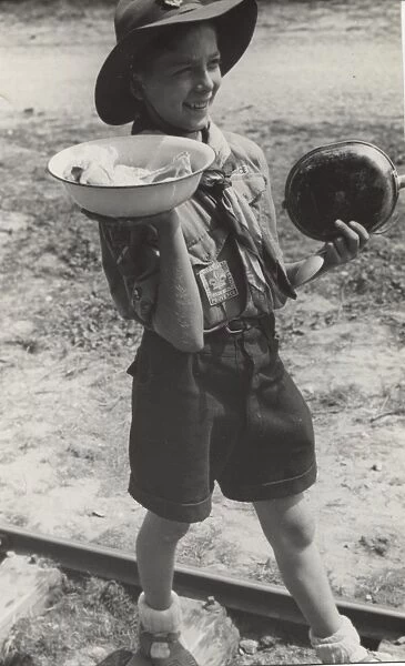 French scout with dish of meat