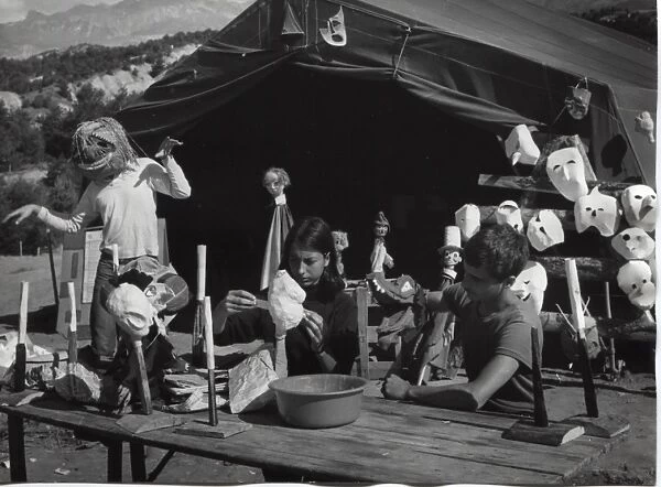 French scouts making masks at camp