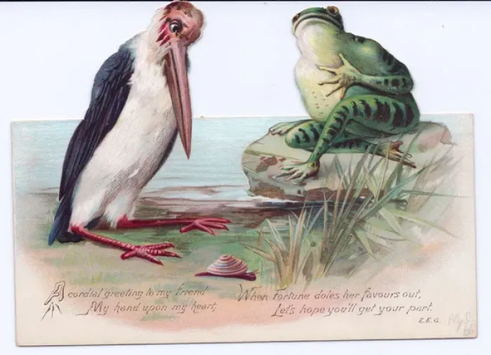 Framed Print : Frog and stork on a cutout Christmas card Framed Print : Frog and stork on a cutout Christmas card