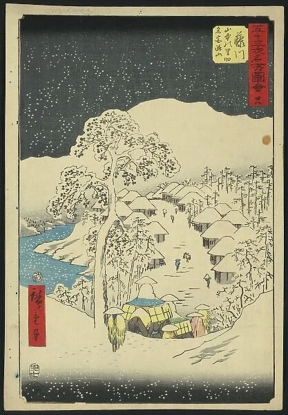 Fujikawa. Print shows pilgrims passing through a small village in a snow-covered