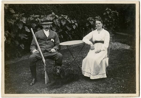 The Gamekeeper and his wife (and their pet black spaniel)