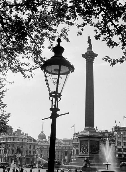 Gas lamp and Nelsons Column, Trafalgar Square, London