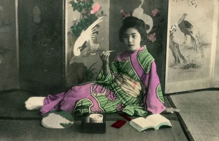 Framed Print : Geisha seated before a folding screen featuring cranes Framed Print : Geisha seated before a folding screen featuring cranes
