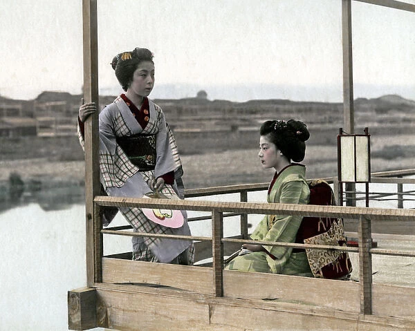 Two geishas on a balcony, Japan