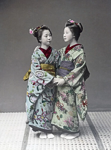Geishas with ornate kimonos, Japan, circa 1880s. Date: circa 1880s