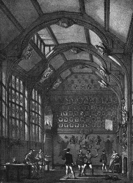 General scene in The Hall, Adlington, Cheshire. Several men enjoy some playful fencing