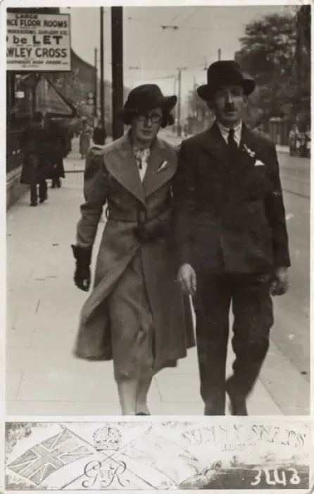 Framed Print : Gent and his daughter stroll down a London street Framed Print : Gent and his daughter stroll down a London street