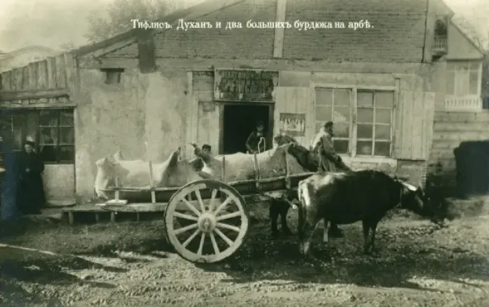Framed Print : Georgia - Tbilisi - Man selling delivering water in ox skins Framed Print : Georgia - Tbilisi - Man selling delivering water in ox skins