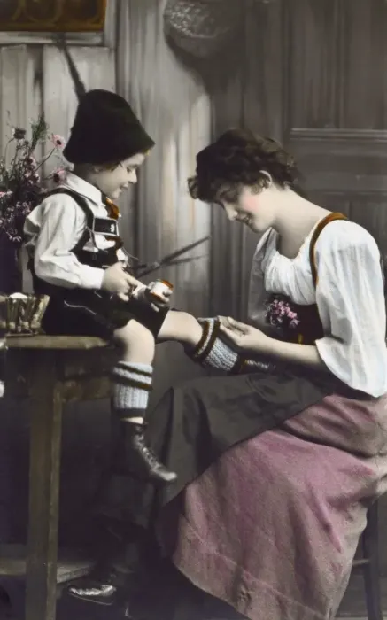 Framed Print : German Bavarian Mother mends her young sons sock Framed Print : German Bavarian Mother mends her young sons sock