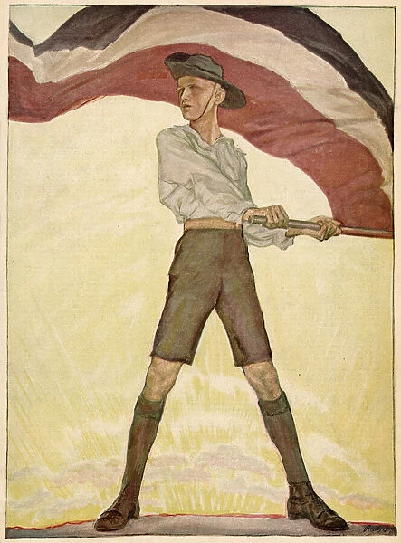 A German youth, with the national flag. Date: 1916