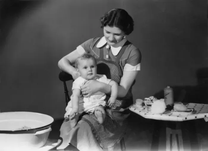 Framed Print : Getting baby ready for his bath Framed Print : Getting baby ready for his bath