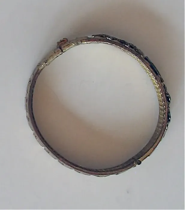 Framed Print : Gilded copper drive band fashioned as a patriotic bracelet Framed Print : Gilded copper drive band fashioned as a patriotic bracelet