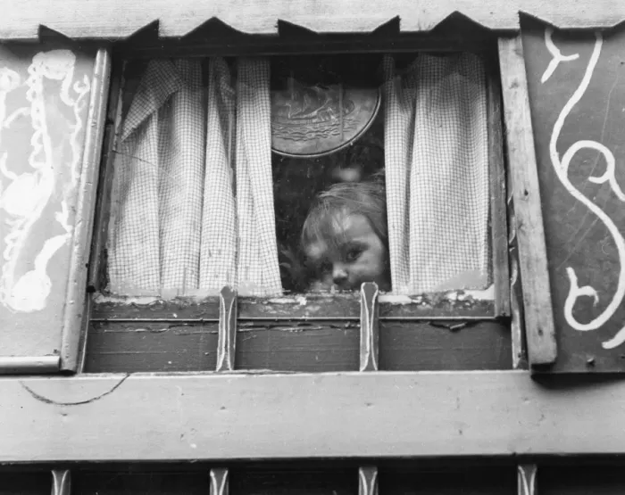 Framed Print : Gipsy toddler peeping out of his caravan Framed Print : Gipsy toddler peeping out of his caravan