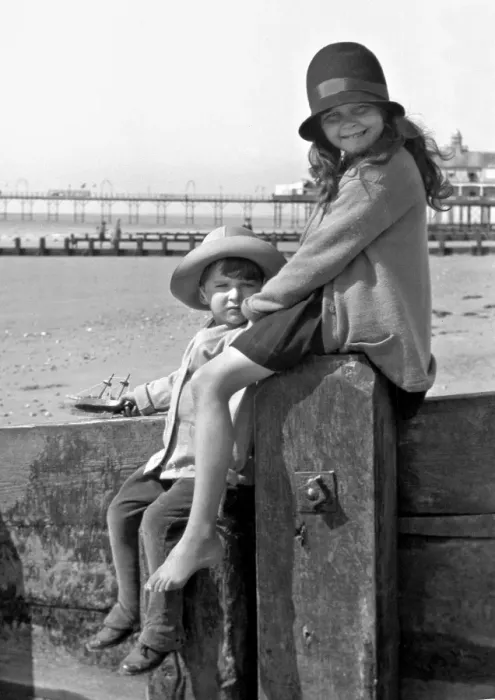 Framed Print : Girl and boy at the seaside Framed Print : Girl and boy at the seaside