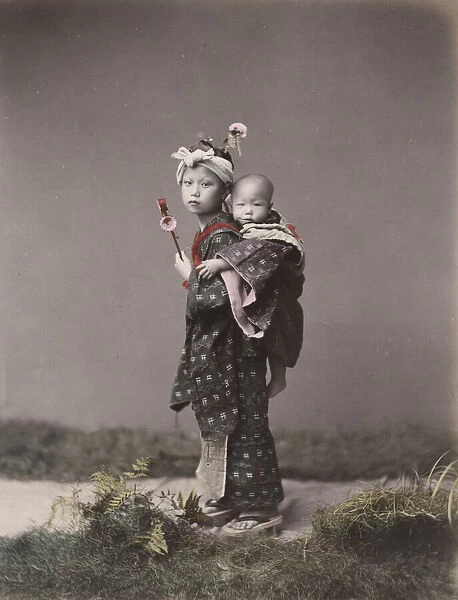 Girl carrying a baby, Japan