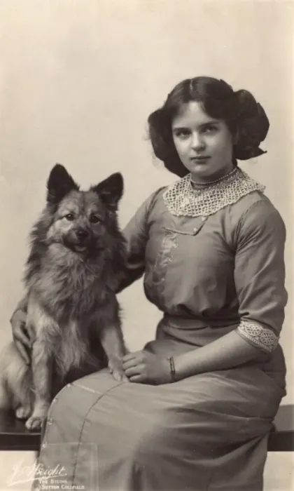 Framed Print : Girl with dog in studio photo Framed Print : Girl with dog in studio photo
