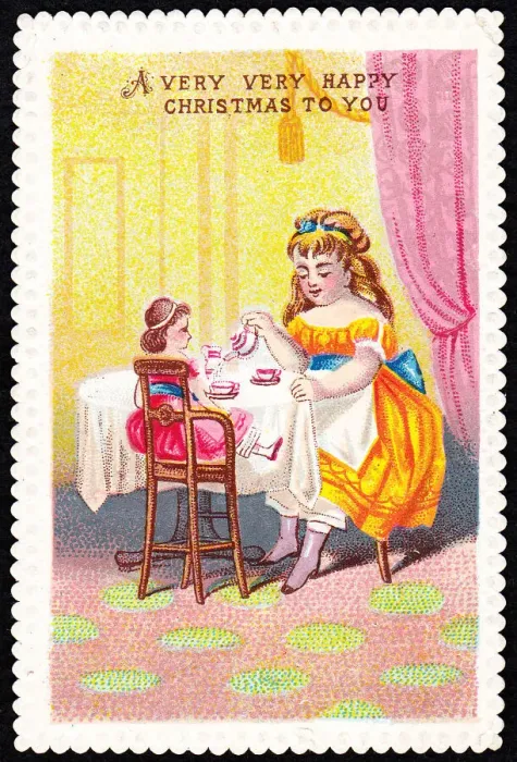 Framed Print : Girl and doll having tea on a Christmas card Framed Print : Girl and doll having tea on a Christmas card