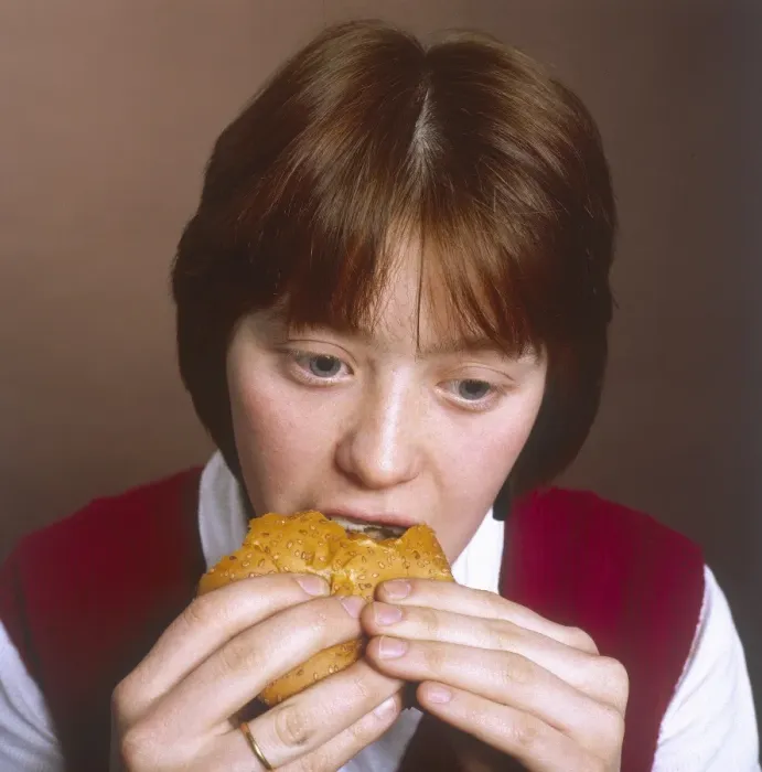 Framed Print : Girl Eating a Hamburger Framed Print : Girl Eating a Hamburger
