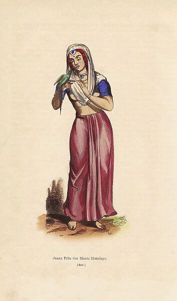 Girl from the Himalayan mountains playing with a parrot