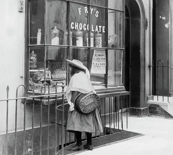 Framed Print : Girl looking in sweet shop window Victorian period Framed Print : Girl looking in sweet shop window Victorian period