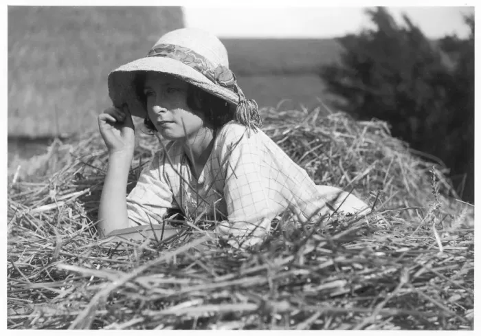 Framed Print : Girl Lying on Haystack Framed Print : Girl Lying on Haystack