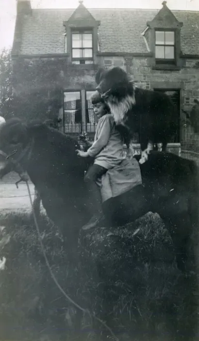 Framed Print : Girl with pet dog on horseback, 1920s Framed Print : Girl with pet dog on horseback, 1920s