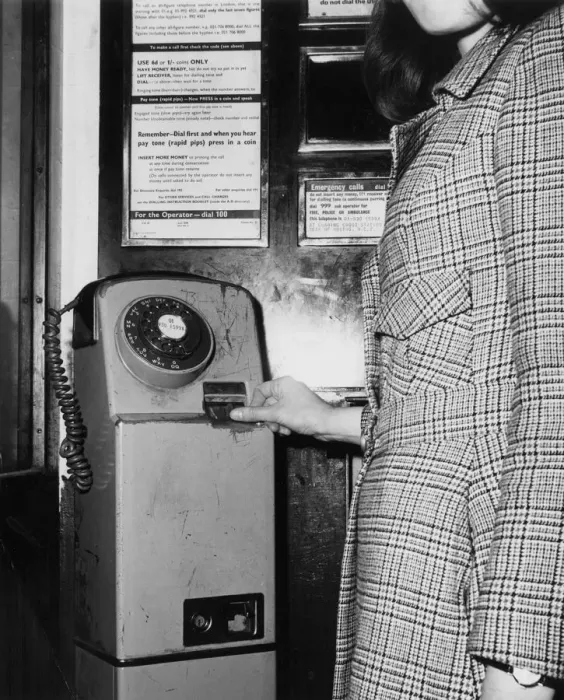 Framed Print : GIRL IN PHONE BOX Framed Print : GIRL IN PHONE BOX