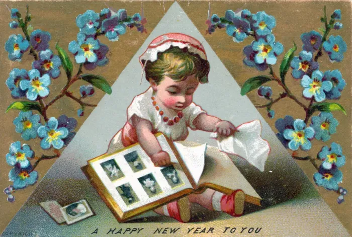 Framed Print : Girl with picture album on a New Year postcard Framed Print : Girl with picture album on a New Year postcard