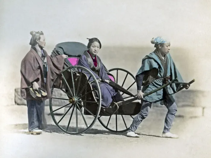 Framed Print : Girl in rickshaw, Japan, circa 1880s. Date: circa 1880s Framed Print : Girl in rickshaw, Japan, circa 1880s. Date: circa 1880s