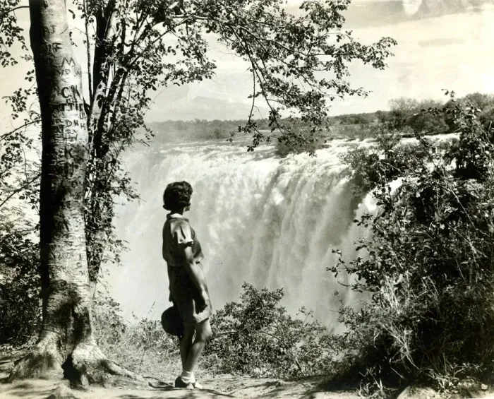 Framed Print : Girl standing by Victoria Falls, southern Africa Framed Print : Girl standing by Victoria Falls, southern Africa