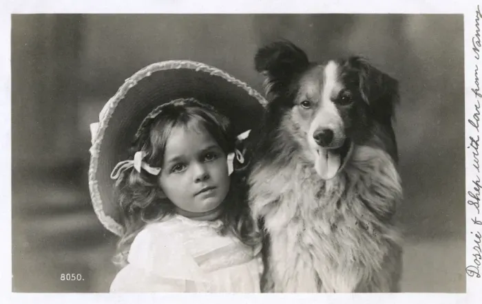 Framed Print : Girl in straw hat with dog
