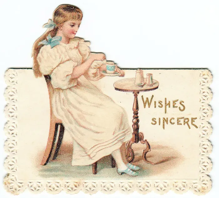 Framed Print : Girl at a table on a cutout greetings card Framed Print : Girl at a table on a cutout greetings card