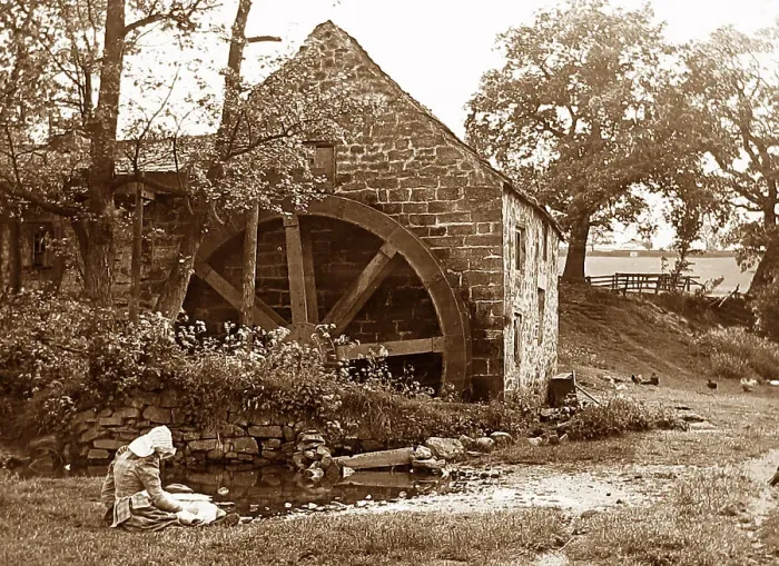 Framed Print : Girl by a water mill Framed Print : Girl by a water mill
