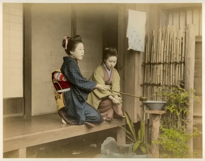 Framed Print : Girls on balcony - washing hands Framed Print : Girls on balcony - washing hands