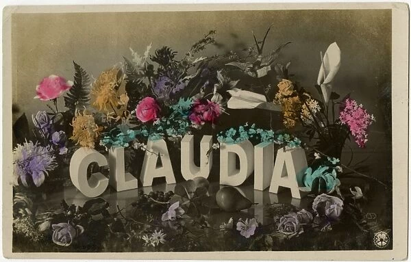The Girls name Claudia surrounded by flowers and fruit