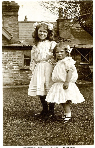 Two girls in a garden, Kodak publicity postcard
