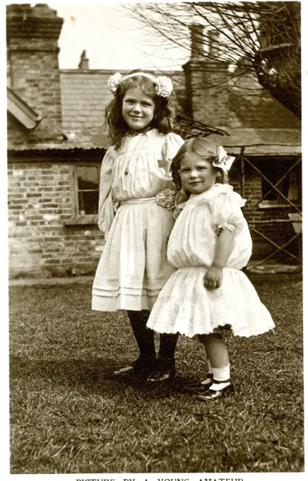 Framed Print : Two girls in a garden, Kodak publicity postcard Framed Print : Two girls in a garden, Kodak publicity postcard