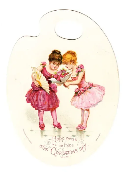 Framed Print : Two girls in pink on a palette-shaped Christmas card Framed Print : Two girls in pink on a palette-shaped Christmas card