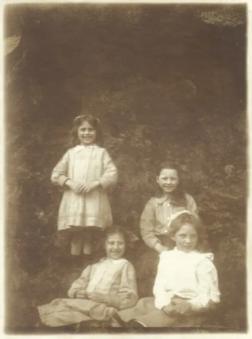 Framed Print : Four girls smiling in a garden Framed Print : Four girls smiling in a garden