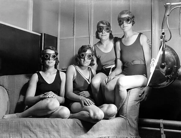Girls on Sun Bed. A group of factory girls from Leeds
