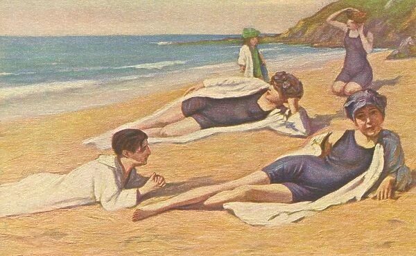 Girls Sunbathing on Sand