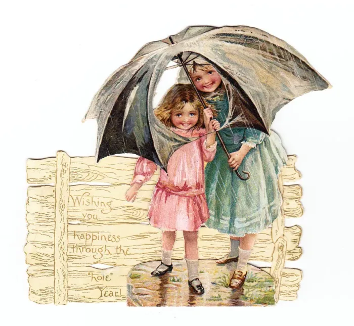 Framed Print : Two girls with umbrella on a cutout New Year card Framed Print : Two girls with umbrella on a cutout New Year card