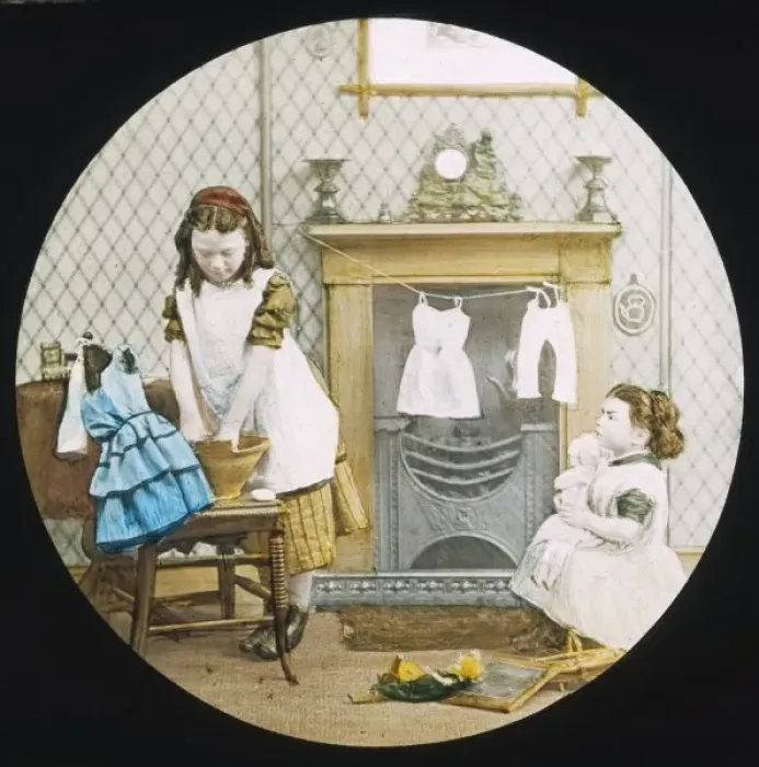 Framed Print : Girls Wash Dolls Clothes Framed Print : Girls Wash Dolls Clothes