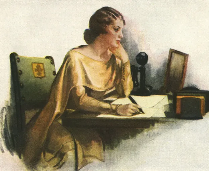 Framed Print : Glamour. Glamorous woman seated at writing desk composing a letter. Date: 1927 Framed Print : Glamour. Glamorous woman seated at writing desk composing a letter. Date: 1927