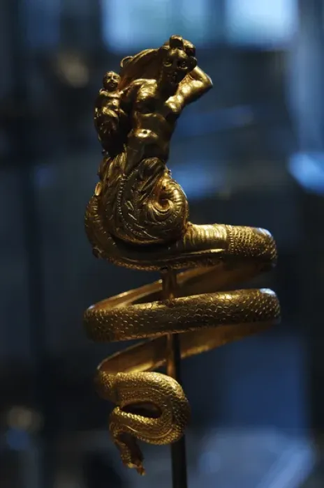 Framed Print : Gold armband with female triton holding a small winged Eros Framed Print : Gold armband with female triton holding a small winged Eros