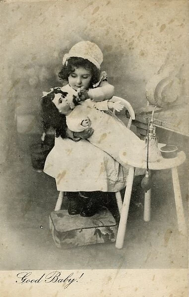 Good Baby -- little girl washing doll