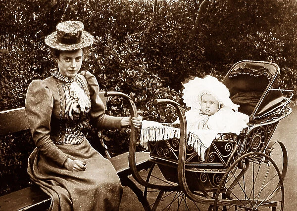 Governess or nanny with baby in pram Victorian period