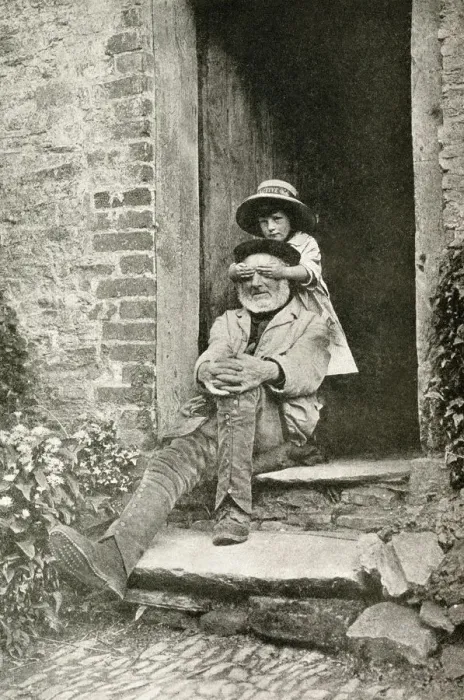 Framed Print : Grandfather and granddaughter in a doorway, England Framed Print : Grandfather and granddaughter in a doorway, England