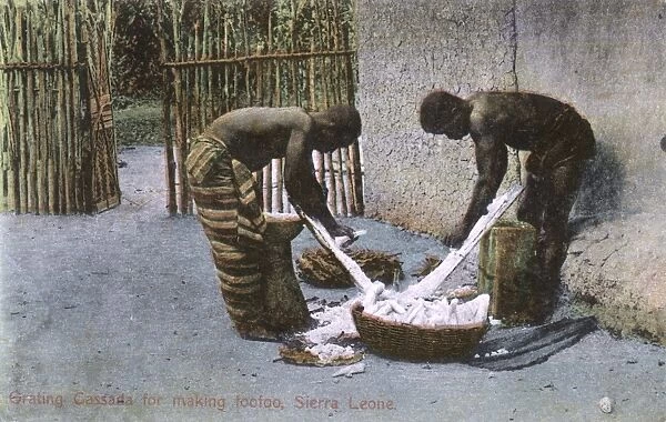 Grating cassava roots, Sierra Leone, West Africa